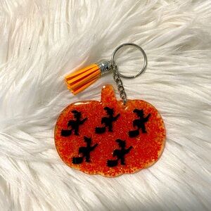 Pumpkin and witches combines for a fun keychain gift Halloween fall theme